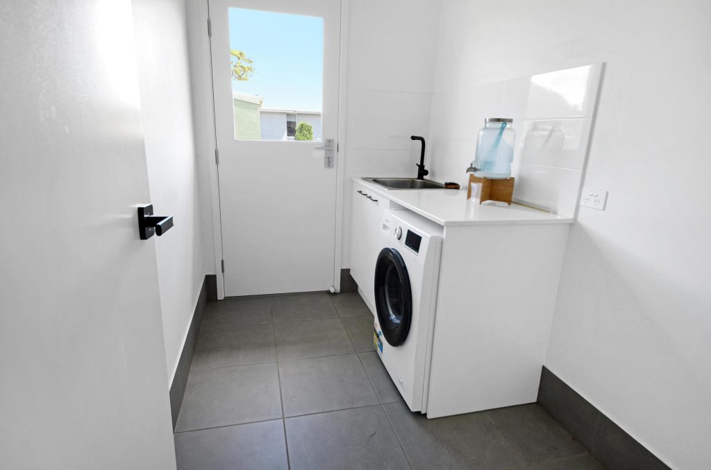 4 Bedroom Home with Side Access and Solar - Gold Coast Real Estate Agents
