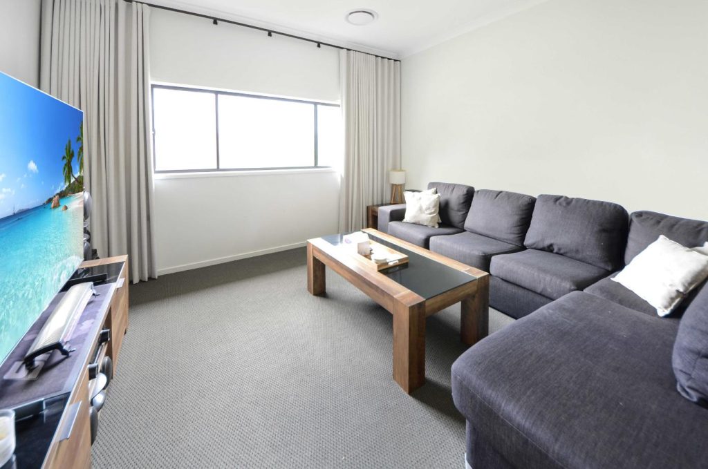 4 Bedroom Home with Side Access and Solar - Gold Coast Real Estate Agents